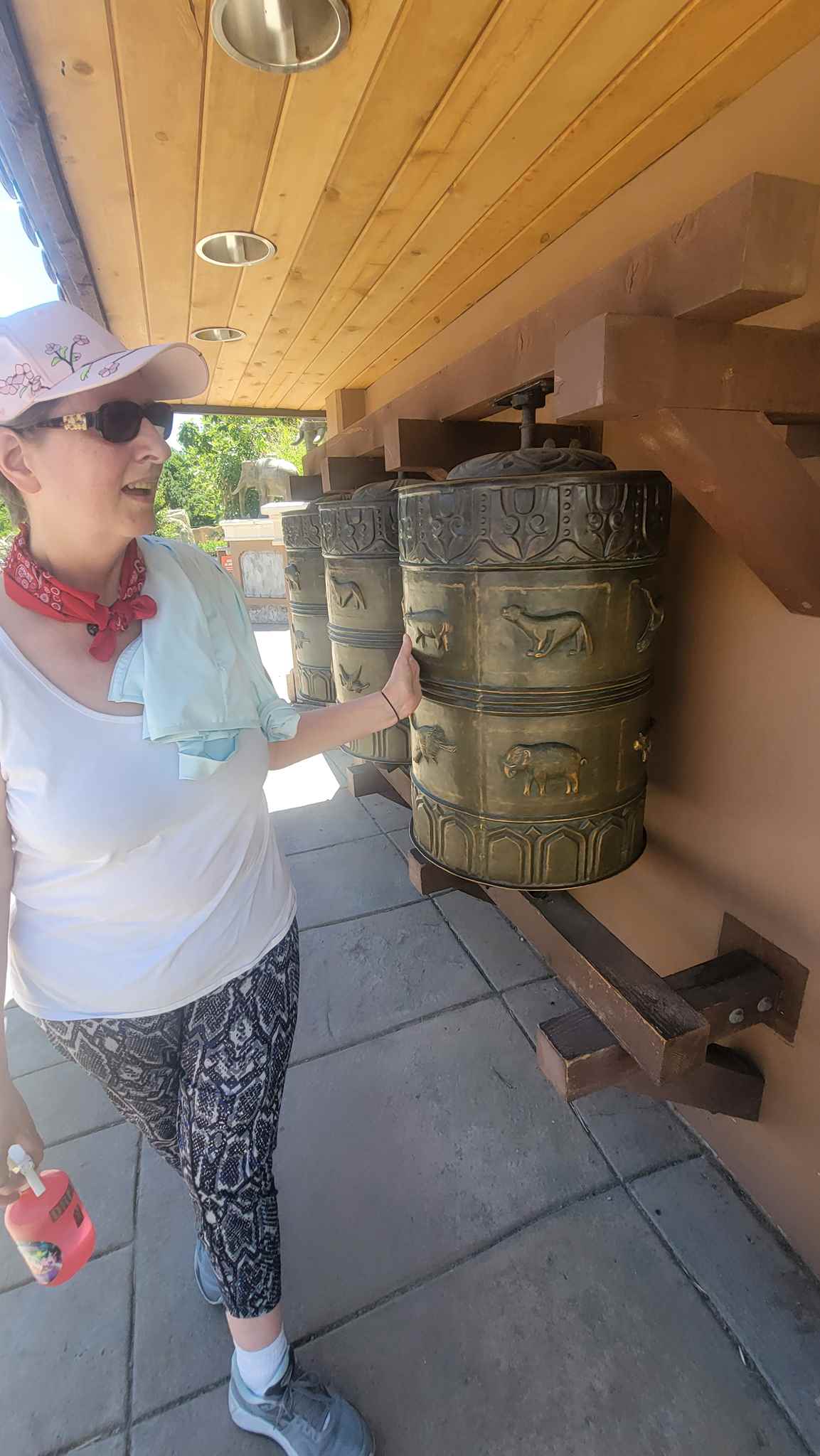 Diana playing with prayer wheels