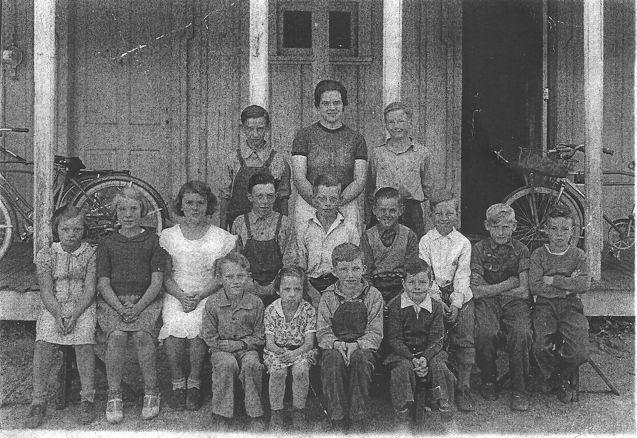 School pic. Dick in Kindergarden and Jack in 1st Grade - both in front row