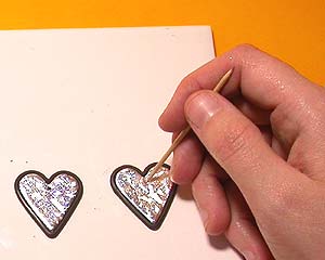 Holographic Earrings project by Emma Ralph